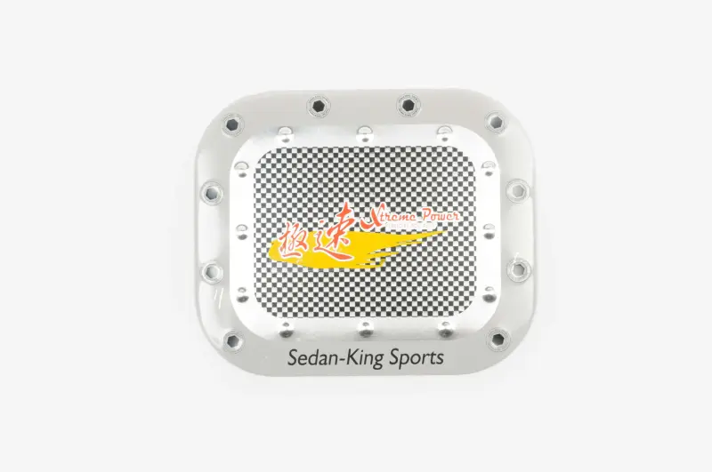 Сталева наліпка на кришку бака Sedan-King Sports 15×13 см №1625