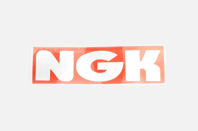 Наліпка з логотипом NGK 12×4 см (#6874)