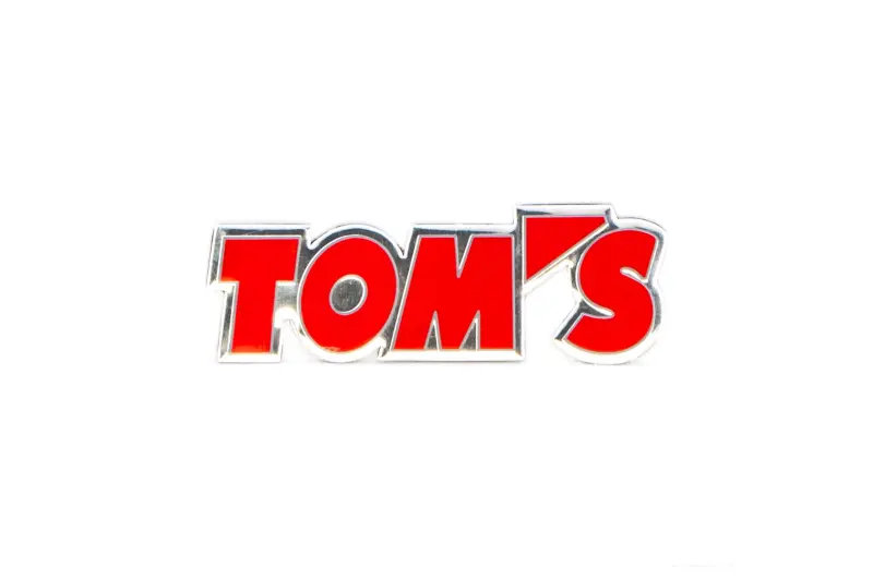 Декоративна наклейка TOM'S 15×7 см, червона